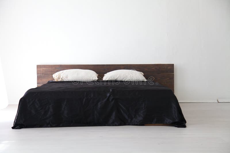 Interior White Bedroom and Bed with Black Sheets Stock Photo Image of