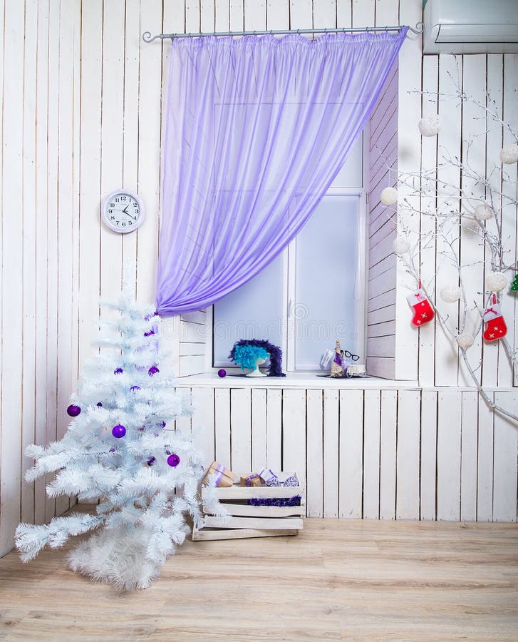 Interior with white Christmas tree