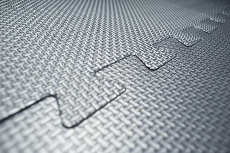 Rubber Interlocking Jigsaw Floor Tiles In A Gym Stock Photo