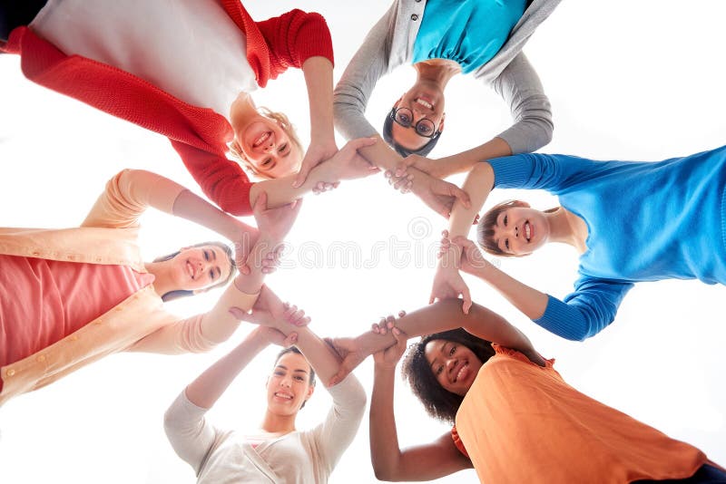 International Group Of Women With Hands Together Stock