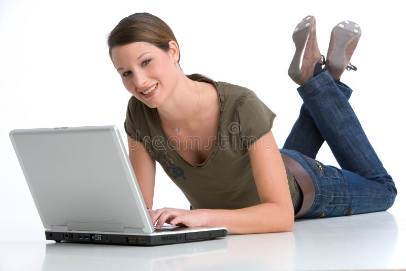 Pretty young woman working with her notebook. Pretty young woman working with her notebook