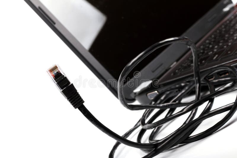 Internet cable and laptop stock photos