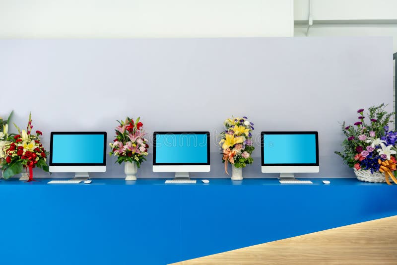 Cafe Interior with Computer, Blank Screen on Blue Table