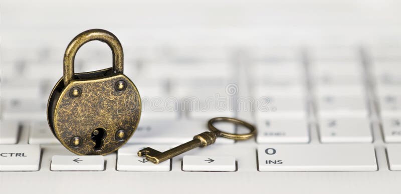 Internet privacy, web security concept, padlock and key on a white keyboard