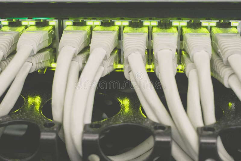 Internet switch with gigabit links is a close-up. The cables patch panel and network hub is in the server room data center. Many royalty free stock photos Internet switch with gigabit links is a close-up. The cables patch panel and network hub is in the server room data center. Many royalty free stock photos