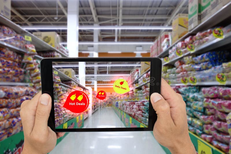 Internet of things marketing concepts,smart augmented reality,customer hold the tablet to see the product that search by ai applic stock photos Internet of things marketing concepts,smart augmented reality,customer hold the tablet to see the product that search by ai applic stock photos