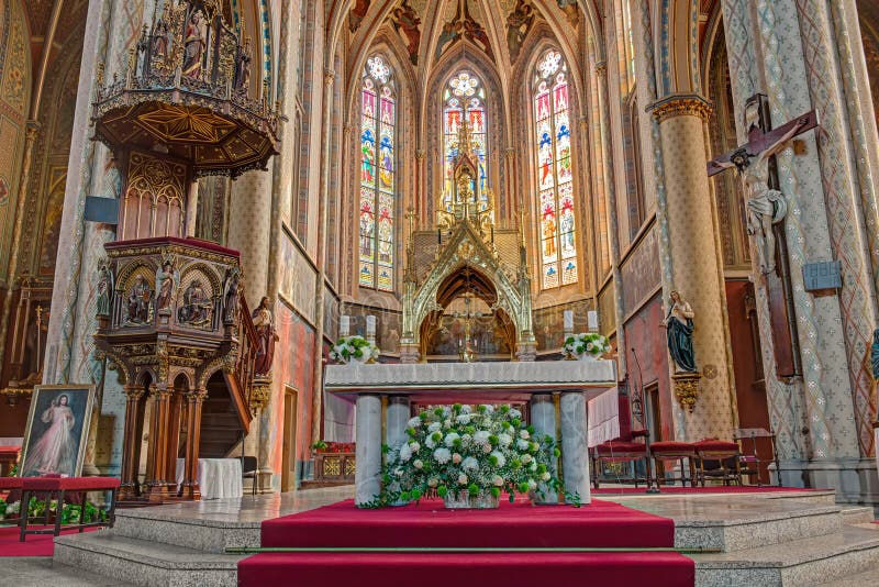 PRAGUE, CZECH REPUBLIC - SEPTEMBER 04, 2014: Interior of the neo-Gothic Church of St. Ludmila at Namesti Miru (Peace Square) in Prague. Hdr image. PRAGUE, CZECH REPUBLIC - SEPTEMBER 04, 2014: Interior of the neo-Gothic Church of St. Ludmila at Namesti Miru (Peace Square) in Prague. Hdr image.