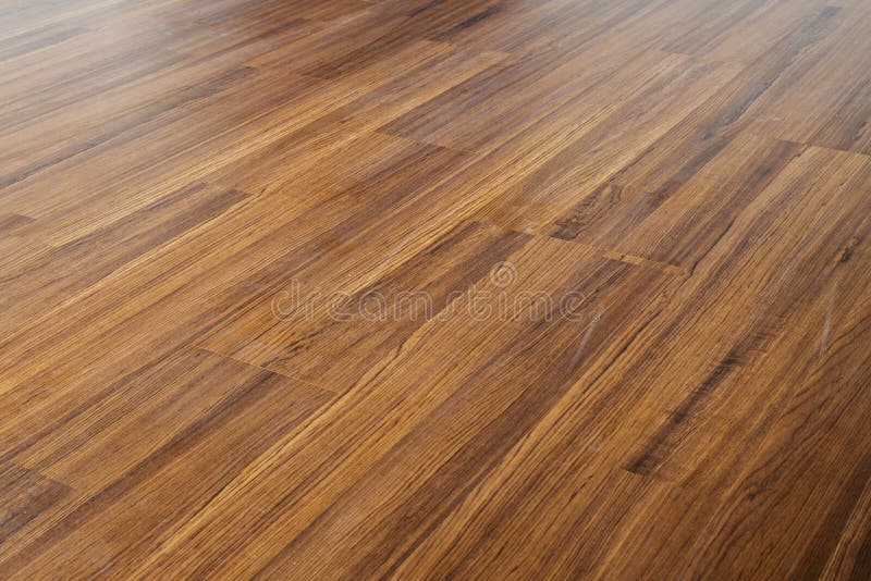 Interno della vernice del pavimento del laminato di legno di Brown nella casa moderna fotografia stock libera da diritti Interno della vernice del pavimento del laminato di legno di Brown nella casa moderna fotografia stock libera da diritti