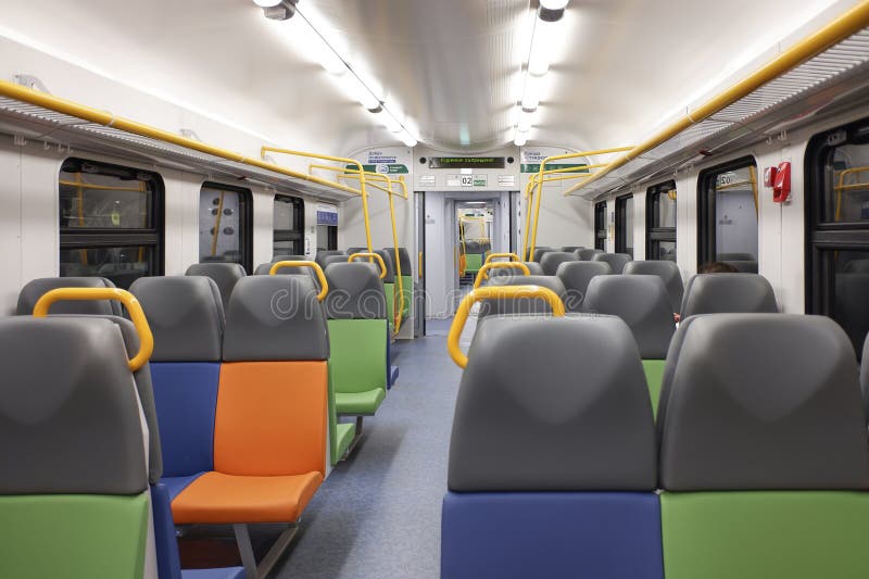 Moscow - September 4, 2020. Interior of a passenger carriage in Russian suburban train. Interior view. Moscow - September 4, 2020. Interior of a passenger carriage in Russian suburban train. Interior view.