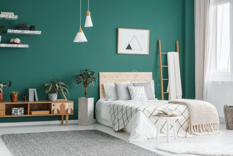 Interno verde della camera da letto di boho immagine stock libera da diritti