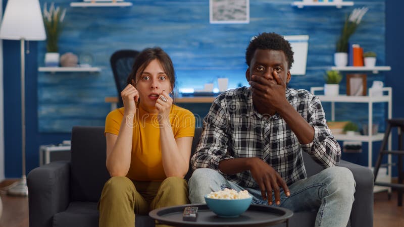 Interracial Couple Watching Drama Movie on Television Stock Image ...