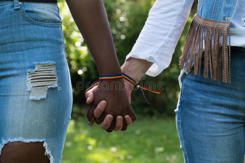 Interracial Lesbian Couple Holding Hands Stock Image Image Of Girlfriends Happiness 246925769 