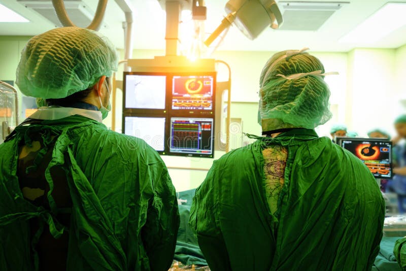 Surgeon doctor with coronary monitor. royalty free stock photography Surgeon doctor with coronary monitor. royalty free stock photography