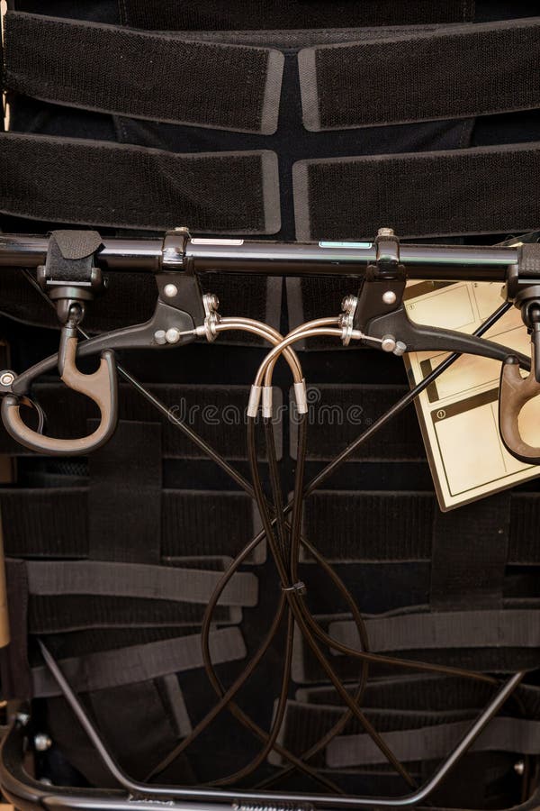 Intricate System of Harnesses and Attachments on a Wheelchair stock photography
