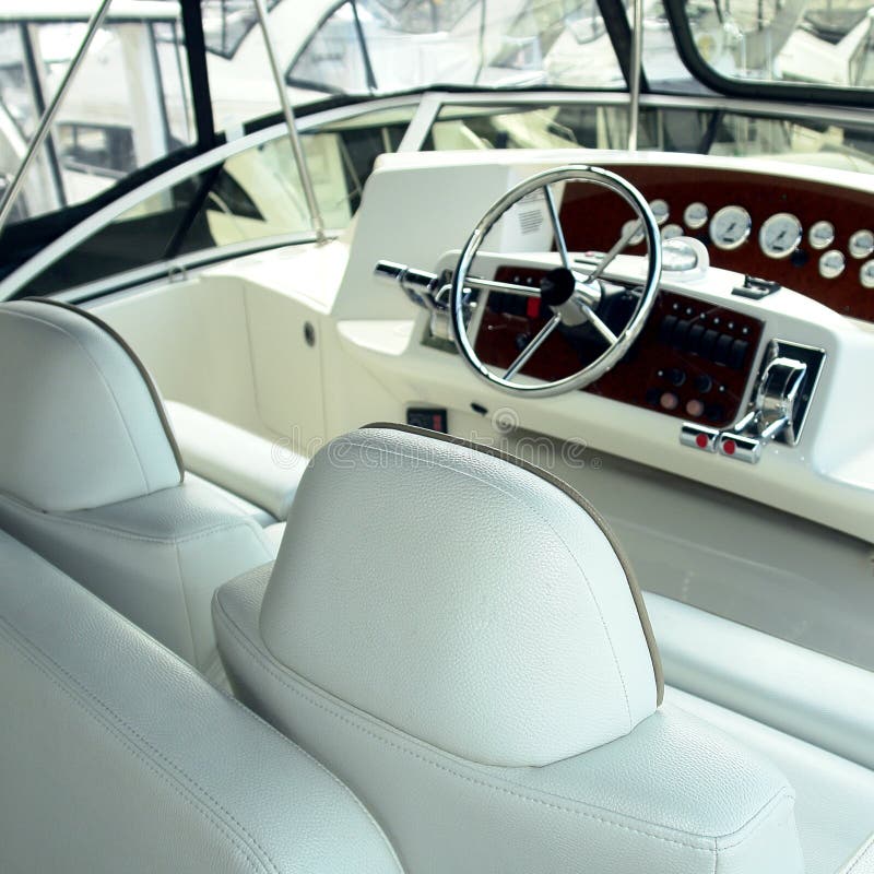 Interior steering wheel area in a luxury yacht. Interior steering wheel area in a luxury yacht