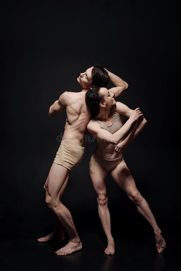 Inventive dance couple taking part in the art performance stock photos