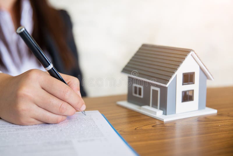Investors signed a contract, Buying and selling real estate. Property investment and house mortgage financial concept, Copy stock images Investors signed a contract, Buying and selling real estate. Property investment and house mortgage financial concept, Copy stock images