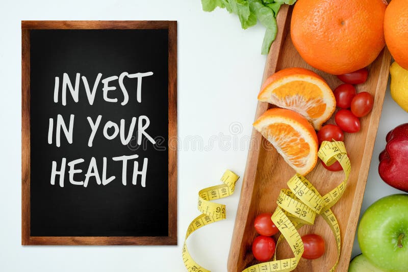 Invest in your health , Healthy lifestyle concept with diet and fitness , Get fit in  , fitness equipment and healthy food s. Invest in your health , Healthy lifestyle concept with diet and fitness , Get fit in  , fitness equipment and healthy food s