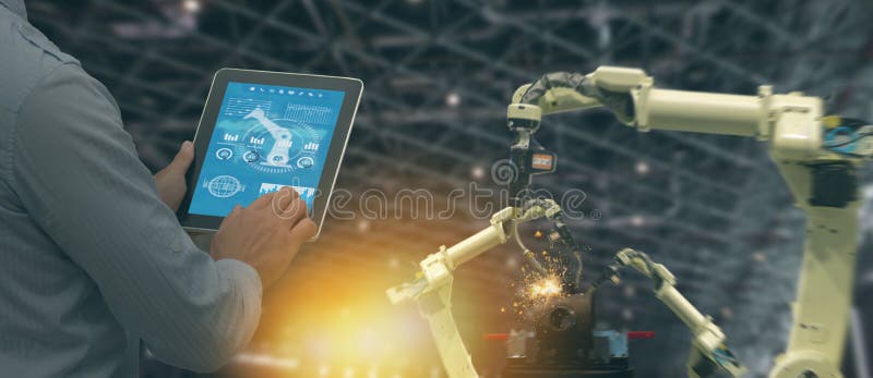 Iot industry 4.0 concept,industrial engineer using software augmented, virtual reality in tablet to monitoring machine in real t stock photography Iot industry 4.0 concept,industrial engineer using software augmented, virtual reality in tablet to monitoring machine in real t stock photography