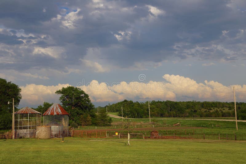 Iowa farm field. With green grass and hay bales royalty free stock photos Iowa farm field. With green grass and hay bales royalty free stock photos