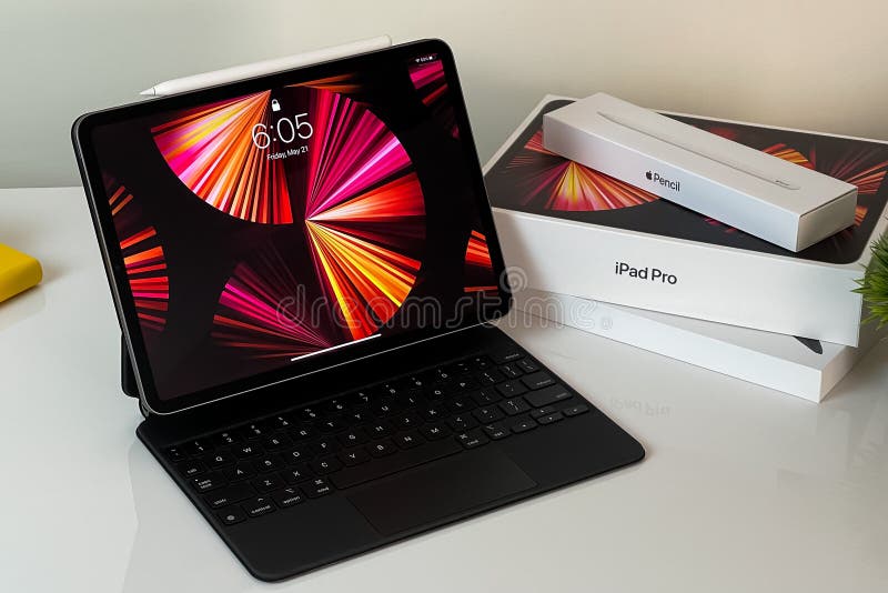 IPad Pro 11-inch 2021 Model with Apple M1 Chip and an Apple IPad Pro 11-inch 2021 Model with Apple M1 Chip and an Apple