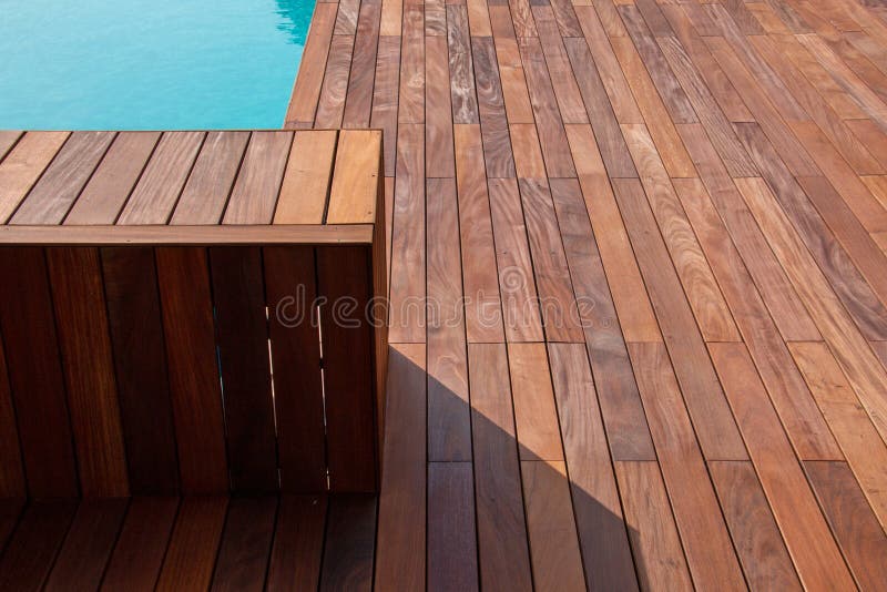 Ipe pool deck design, geometric lines of hardwood timber decking next to the swimming pool