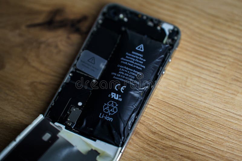 Iphone with Exploded Lithiumion Battery. Liion Swollen Battery