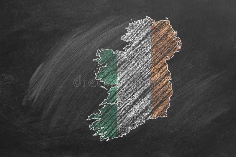 Country map and flag of Ireland drawing with chalk on a blackboard. One of a large series of maps and flags of different countries. Education, travel, study abroad concept. Country map and flag of Ireland drawing with chalk on a blackboard. One of a large series of maps and flags of different countries. Education, travel, study abroad concept.