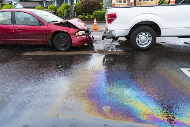 Iridescent oil spill caused by a traffic accident royalty free stock photography Iridescent oil spill caused by a traffic accident royalty free stock photography