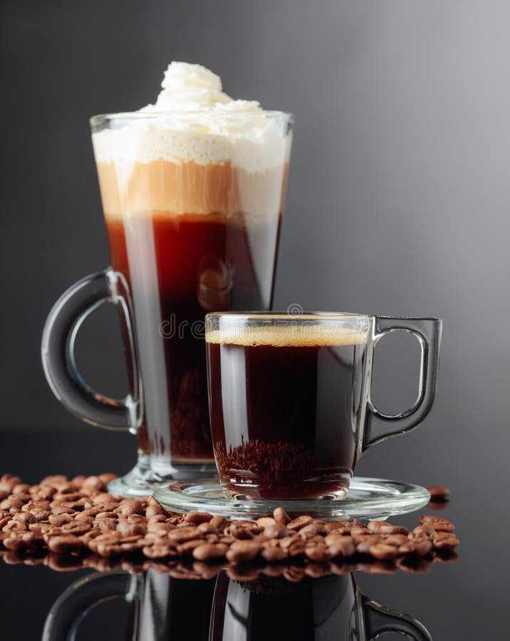 Espresso, Irish Coffee, and Latte on a Black Reflective Background