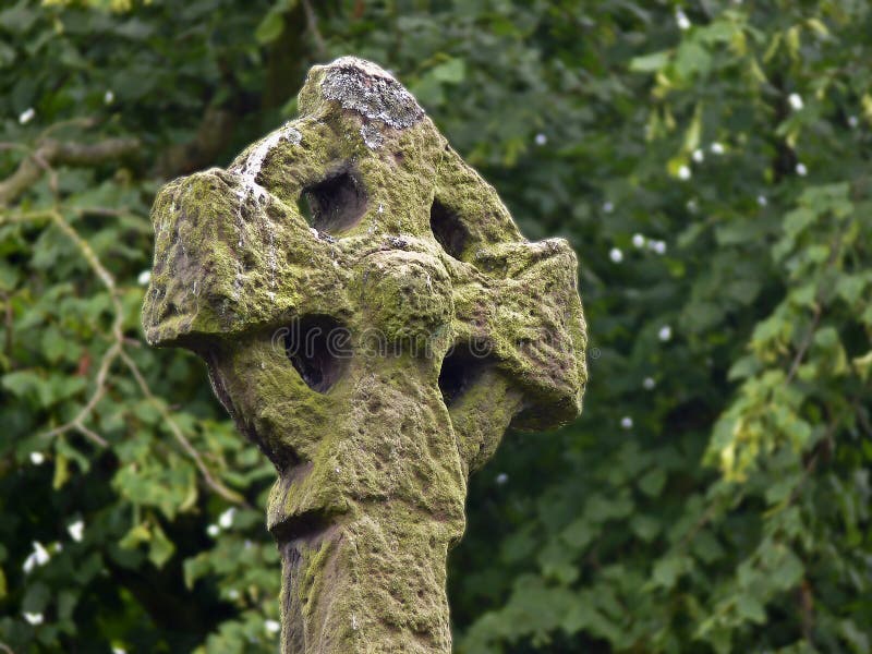 Irish high cross with moss