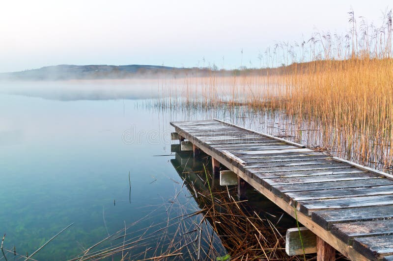 Foggy Lake and Dock stock image. Image of park, state 9364623