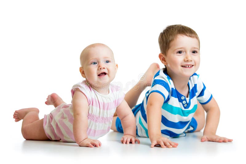 Cute kids brother and sister lying on floor isolated. Cute kids brother and sister lying on floor isolated