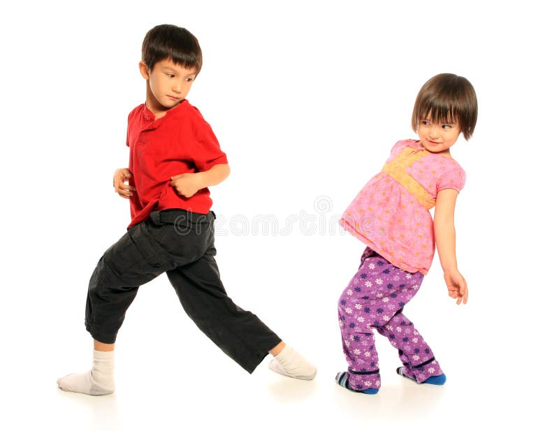 Brother and Sister having fun on pure white background. Brother and Sister having fun on pure white background