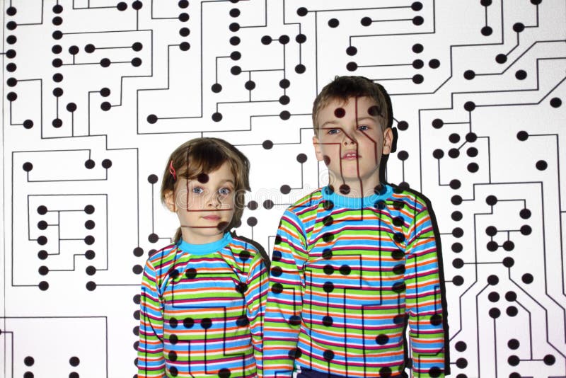 Little brother and sister in striped shirts, circuit, board, projector. Little brother and sister in striped shirts, circuit, board, projector