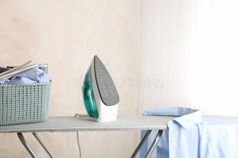 Iron and Clean Laundry on Ironing Board Stock Image Image of color
