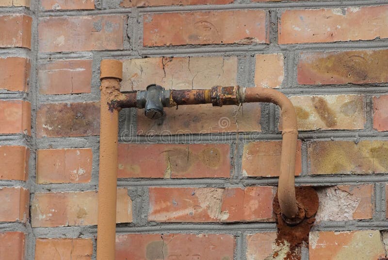 Gas Pipe on Brown Brick Wall Outside Stock Image Image of iron