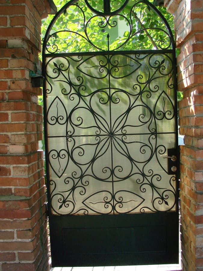 Iron Gate with Wrought Ornament on Stock Image - Image of flower ...
