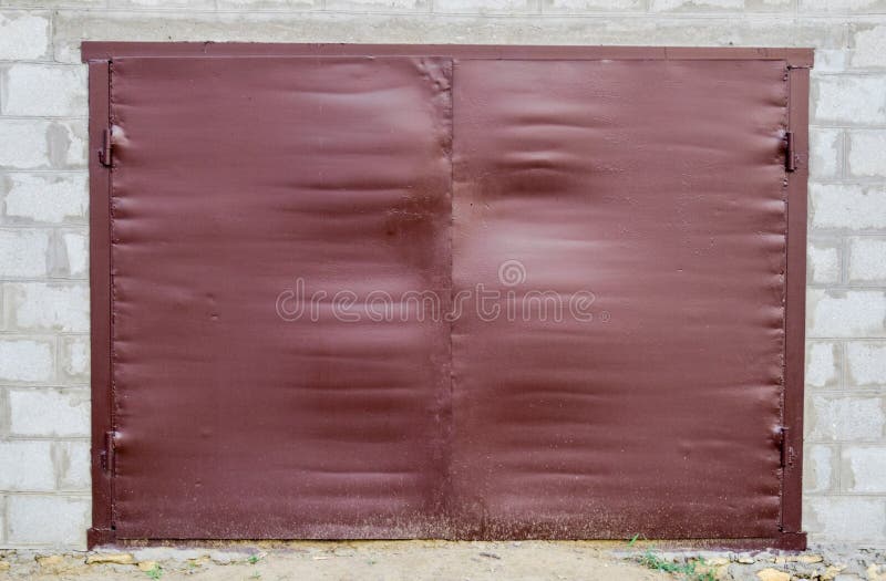 Iron Gates on the Garage. Brown Gates Made Stock Photo Image of lock