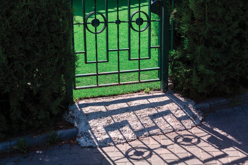 Iron Metal Garden Gate stock photo. Image of garden 240614926