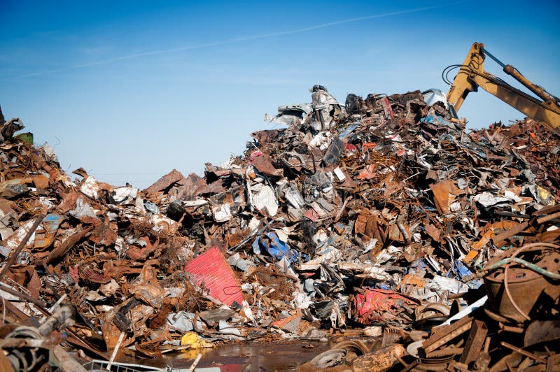 Iron scrap metal compacted to recycle stock image