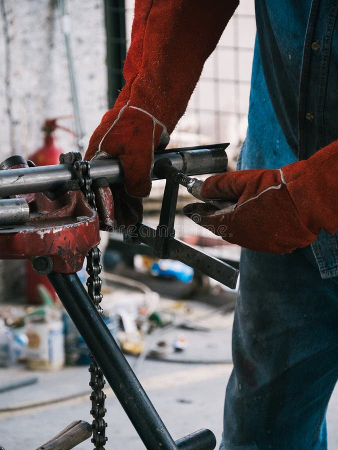 Iron Soldering, Man Working on Iron Soldering, Welding Sparks Stock