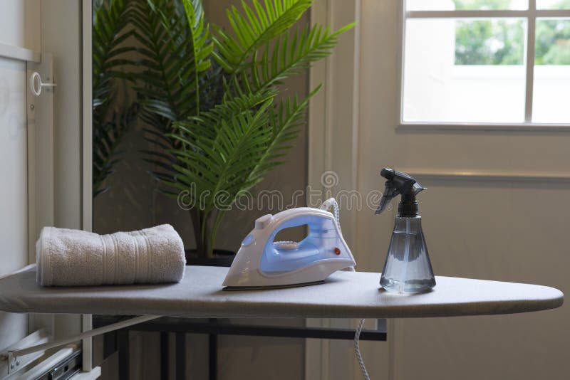 Iron and Spray Bottles on Table, Preparing To Ironing Cloth. Stock Image -  Image of heap, biodegradable: 233945795