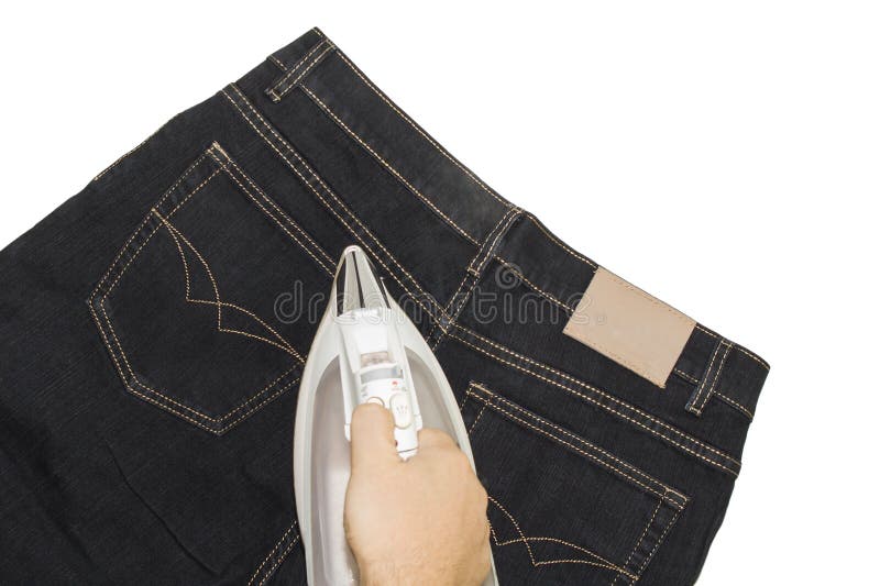 Man Ironing a Pair of Jeans Stock Photo Image of appliance, biker
