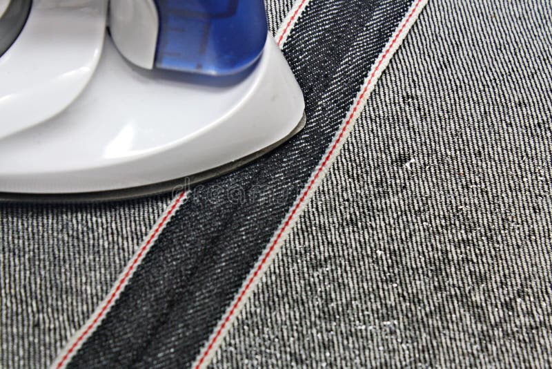 Ironing jeans denim stock image. Image of electrical 91756867