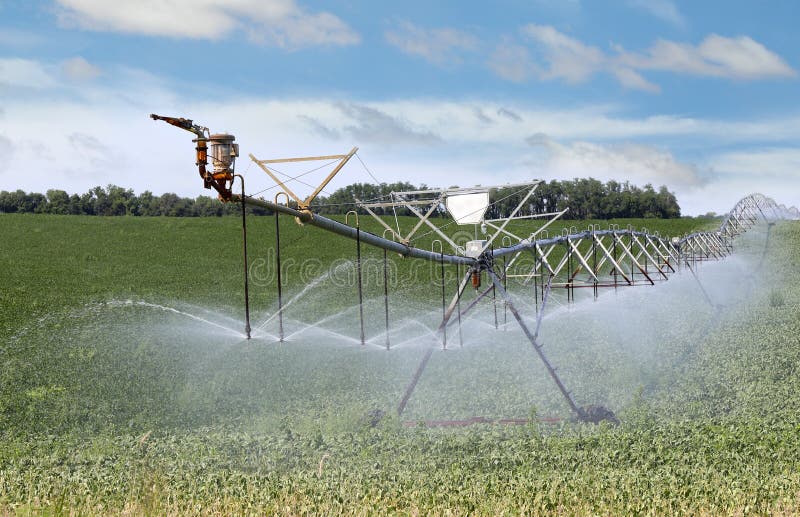 Irrigating Farm Field stock photo. Image of farmland 33125970