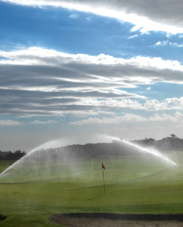 Irrigation golf course stock image. Image of grass, green 30809847