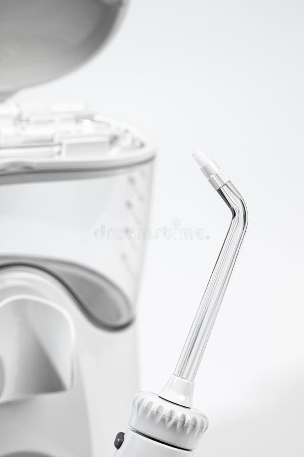 Irrigator for Oral Care on a Light Background Image Stock Image
