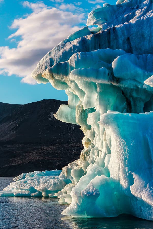 Icebergs which have come off a glacier, float in a bay Bear at east shore of Northern island of archipelago Novaya Zemlya. Icebergs which have come off a glacier, float in a bay Bear at east shore of Northern island of archipelago Novaya Zemlya