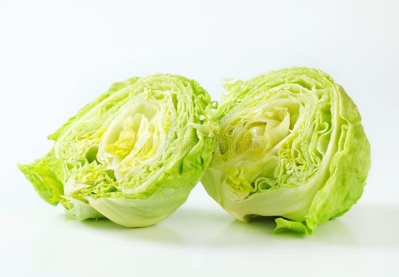 Head of ice lettuce, cut in half. Head of ice lettuce, cut in half